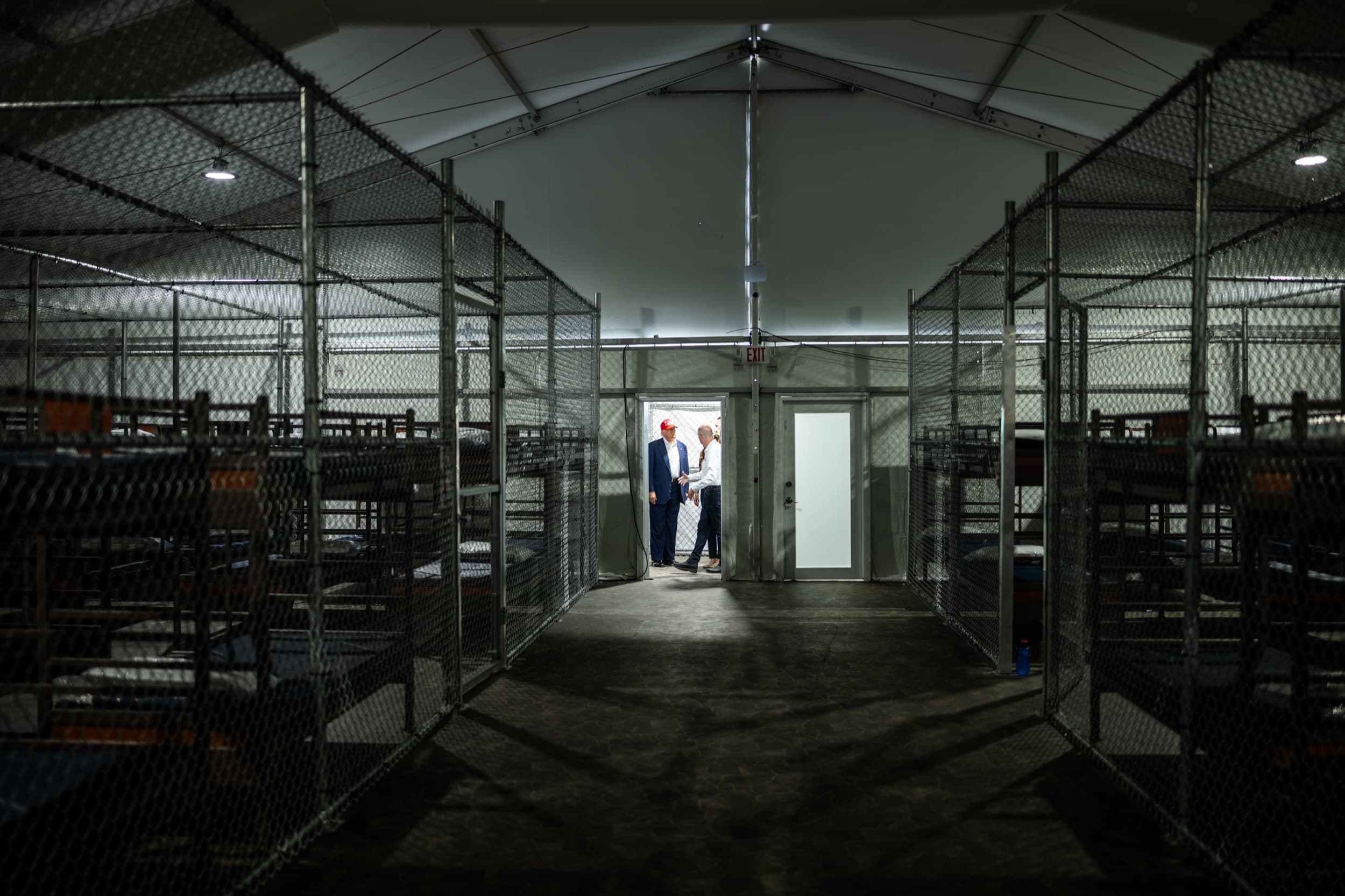Interior of “Alligator Alcatraz,” with President Donald Trump in the background. July 1, 2025. Courtesy the White House, Public domain, via Wikimedia Commons.