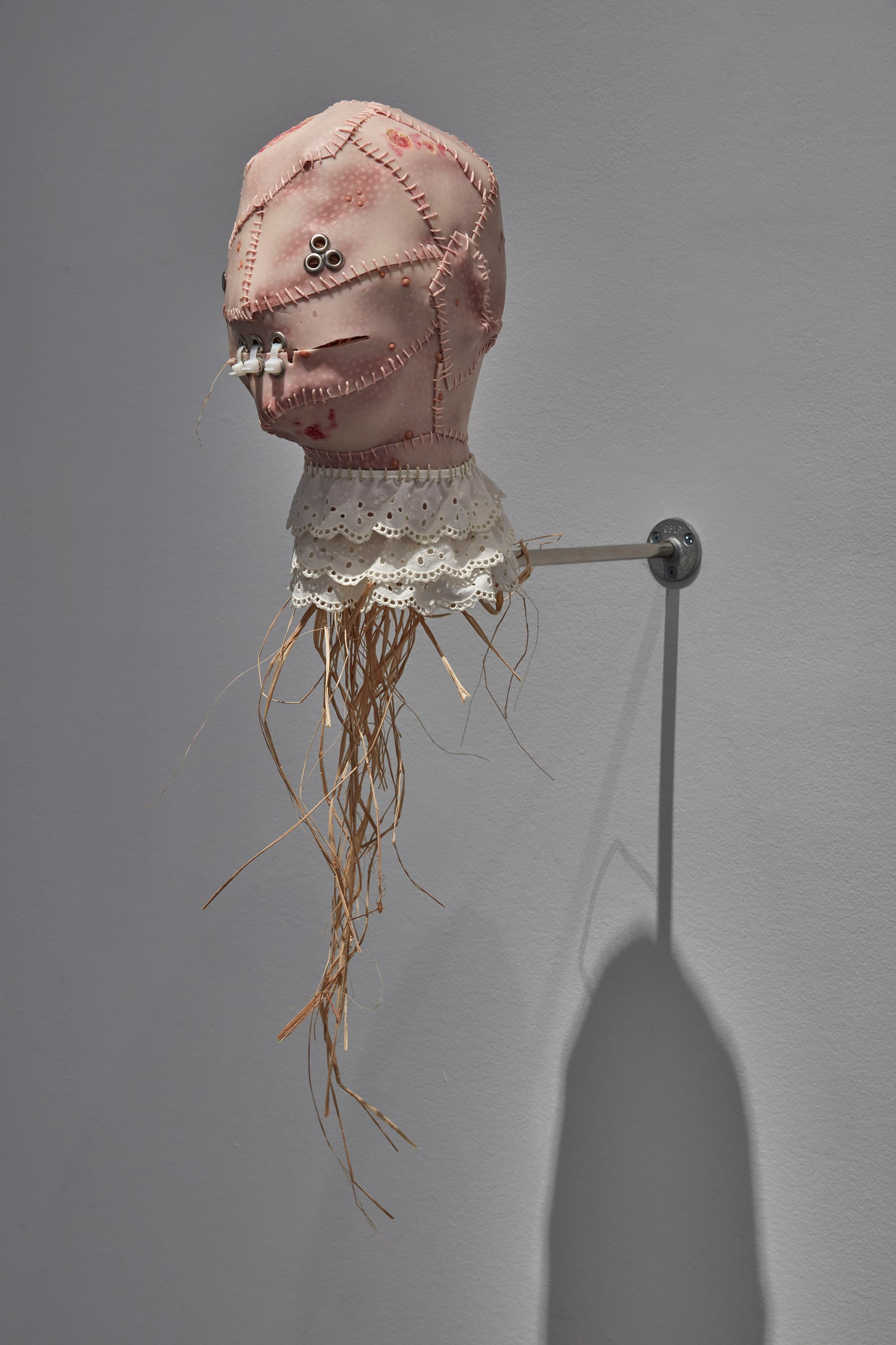 KING COBRA, The Grand High Witch Of All Of The World, 2026. Silicone, printed fabric, tattoo ink, iron, hemp, zip ties, raffia, 34 ½ × 11 × 14 inches. © KING COBRA. Courtesy Sikkema Malloy Jenkins, New York.