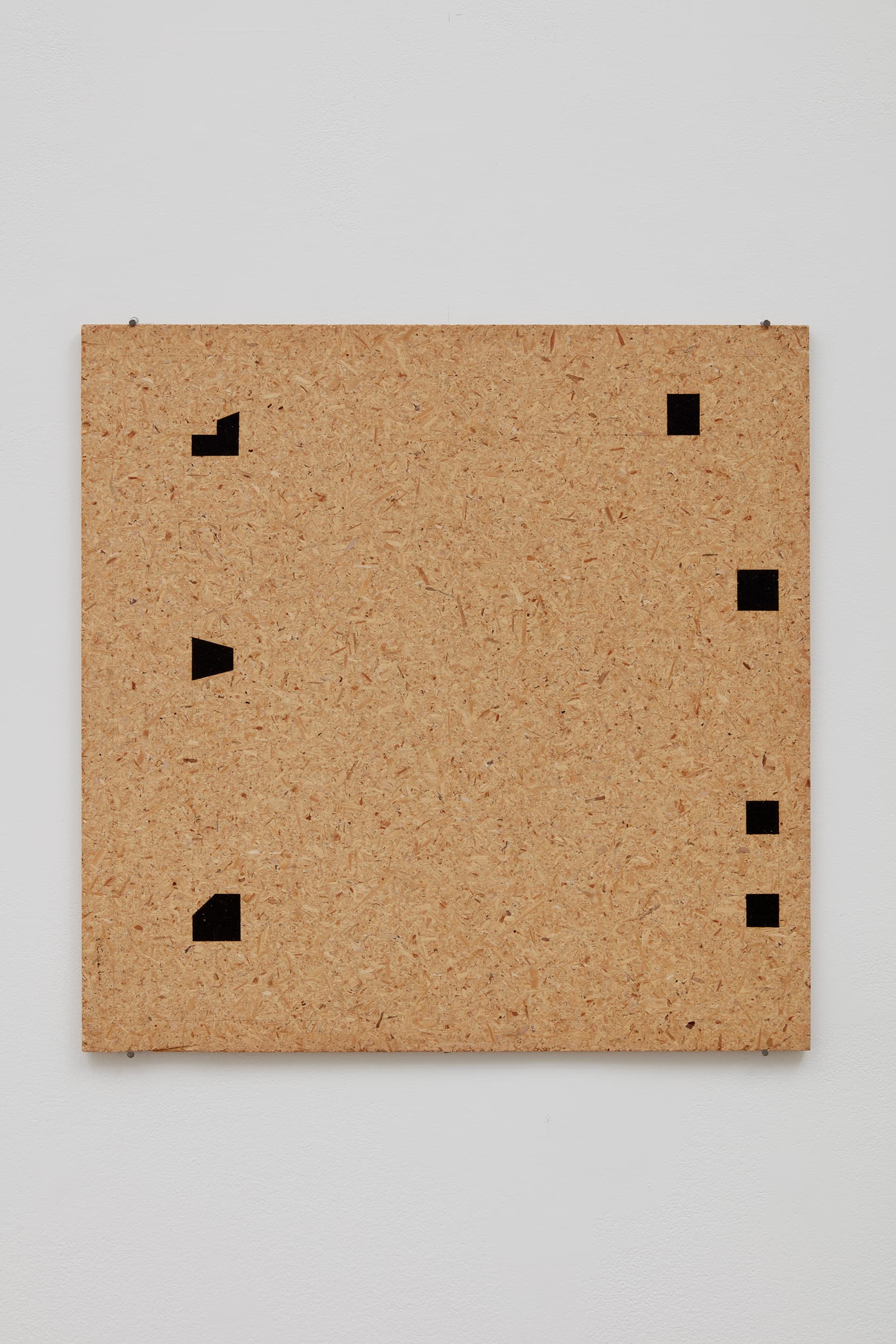 Haim Steinbach, Particle Board with Black Shapes #3, 1976. Oil stick on particle board, 23 × 23 inches. Courtesy the artist and Tanya Bonakdar Gallery, New York.
