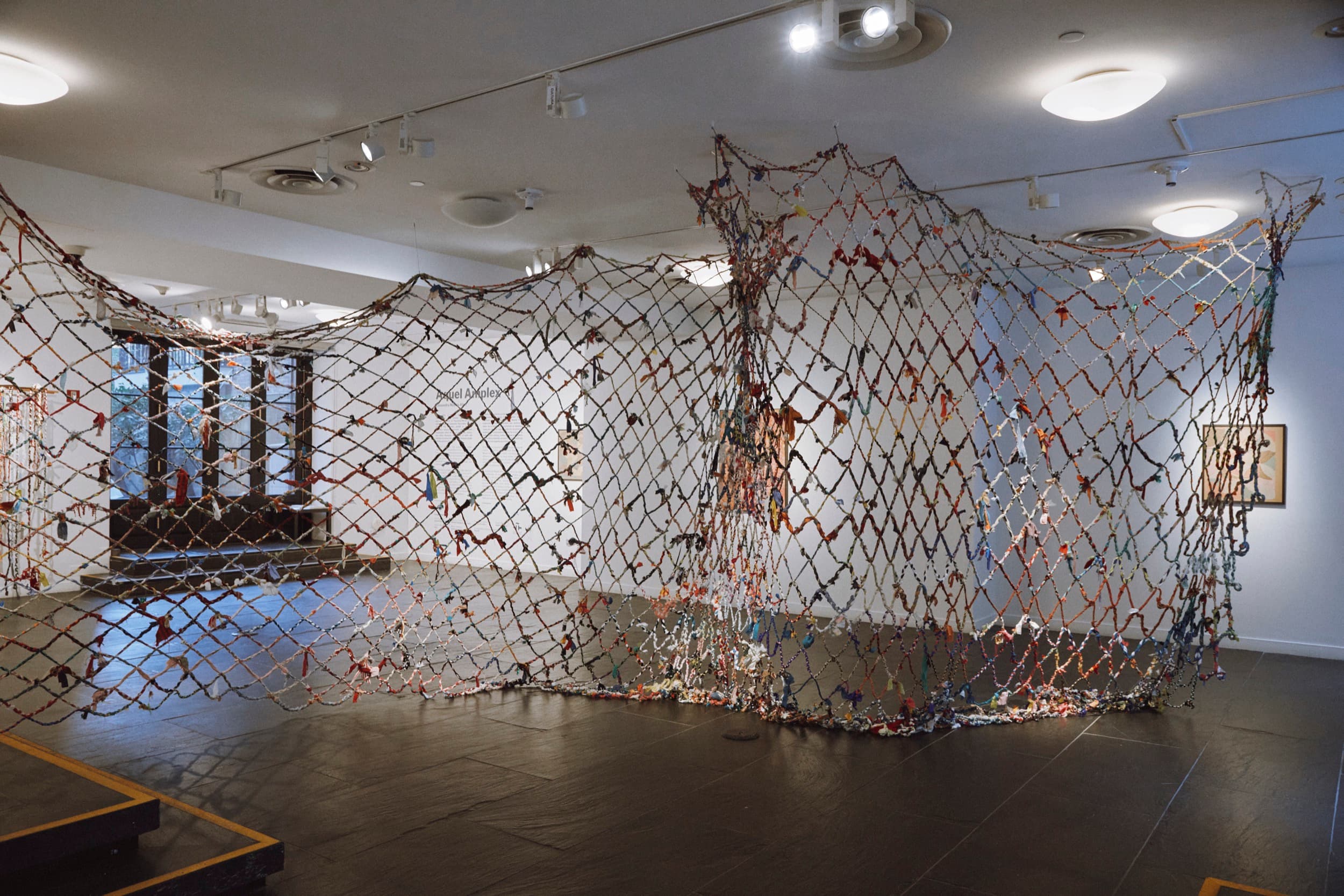 Cassandra Mayela Allen, Aquel Amplex, 2024–26. Found fabrics and garments, braided collectively, variable dimensions. Courtesy the artist and Instituto Cervantes, New York. Photo: Camilo Fuentealba.