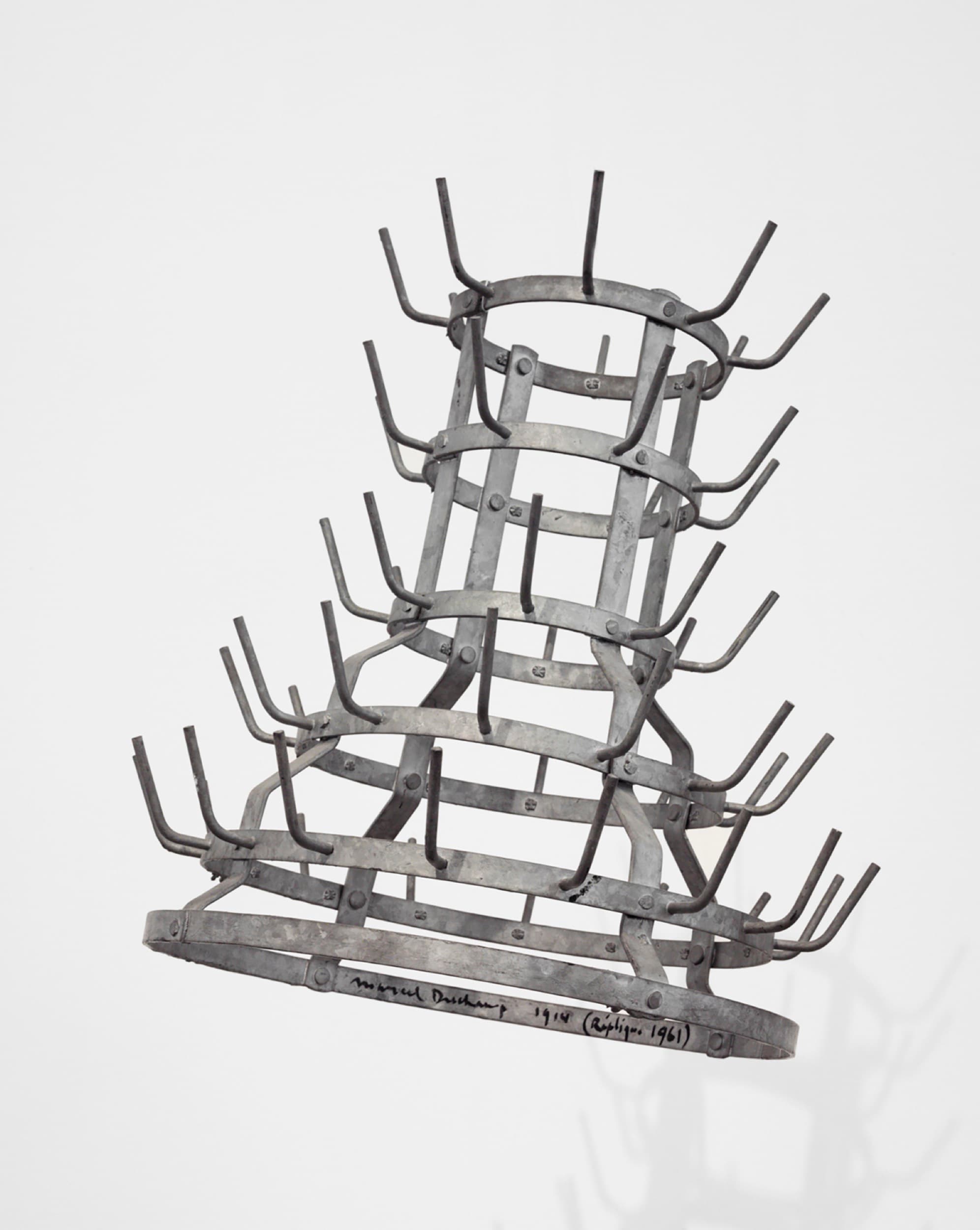 Marcel Duchamp, Bottlerack, 1961 (replica of 1914 original). Galvanized iron, 23 ⅜ × 21 ¼ inches. Philadelphia Art Museum: Gift of Jacqueline, Paul, and Peter Matisse in memory of their mother, Alexina Duchamp, 1998-4-23. Courtesy MoMA.