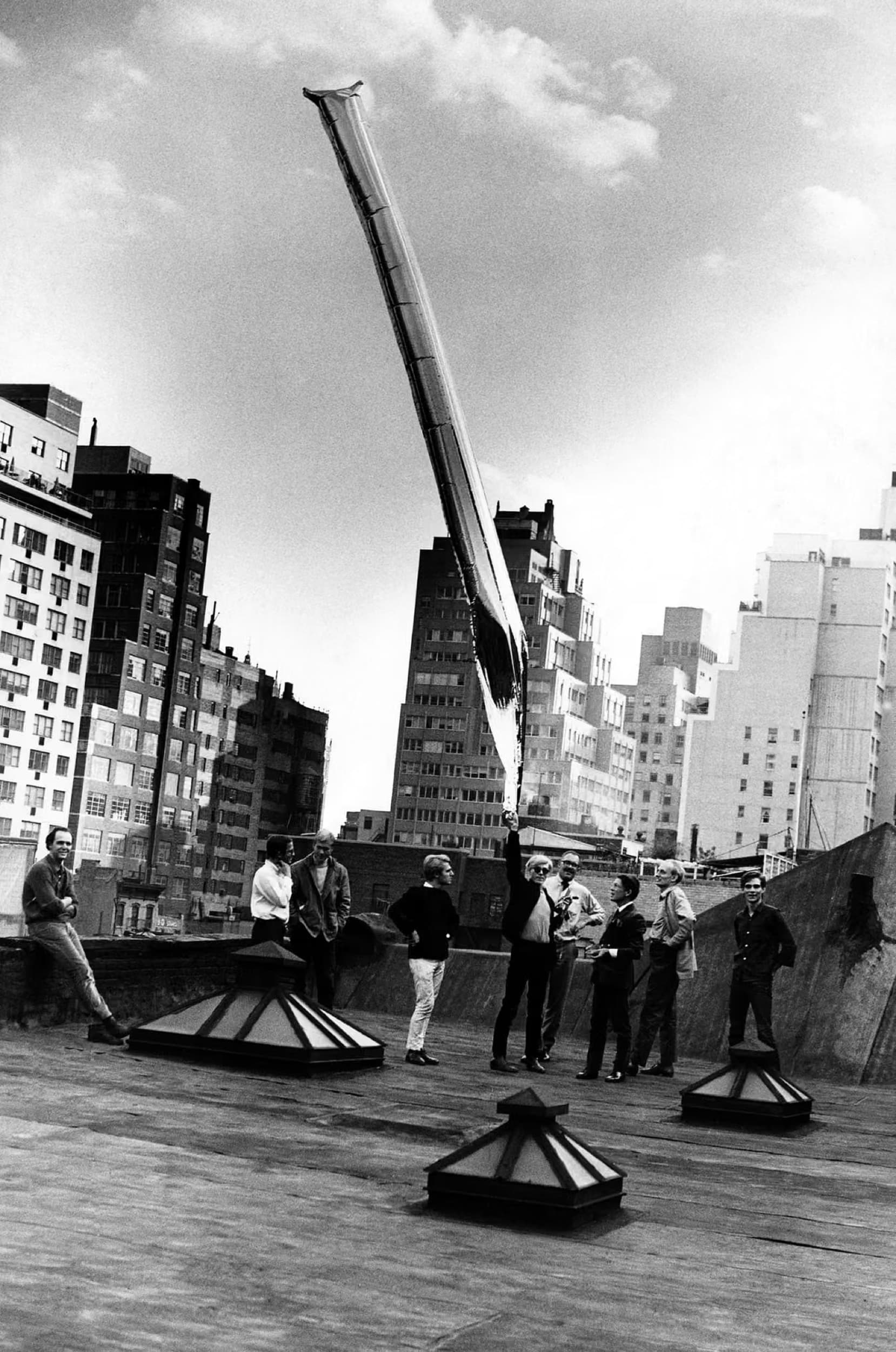 Billy Name, Andy Warhol with silver balloon sculpture, the Factory, 1964. © 2026 Billy Name Estate / Artists Rights Society (ARS), New York.